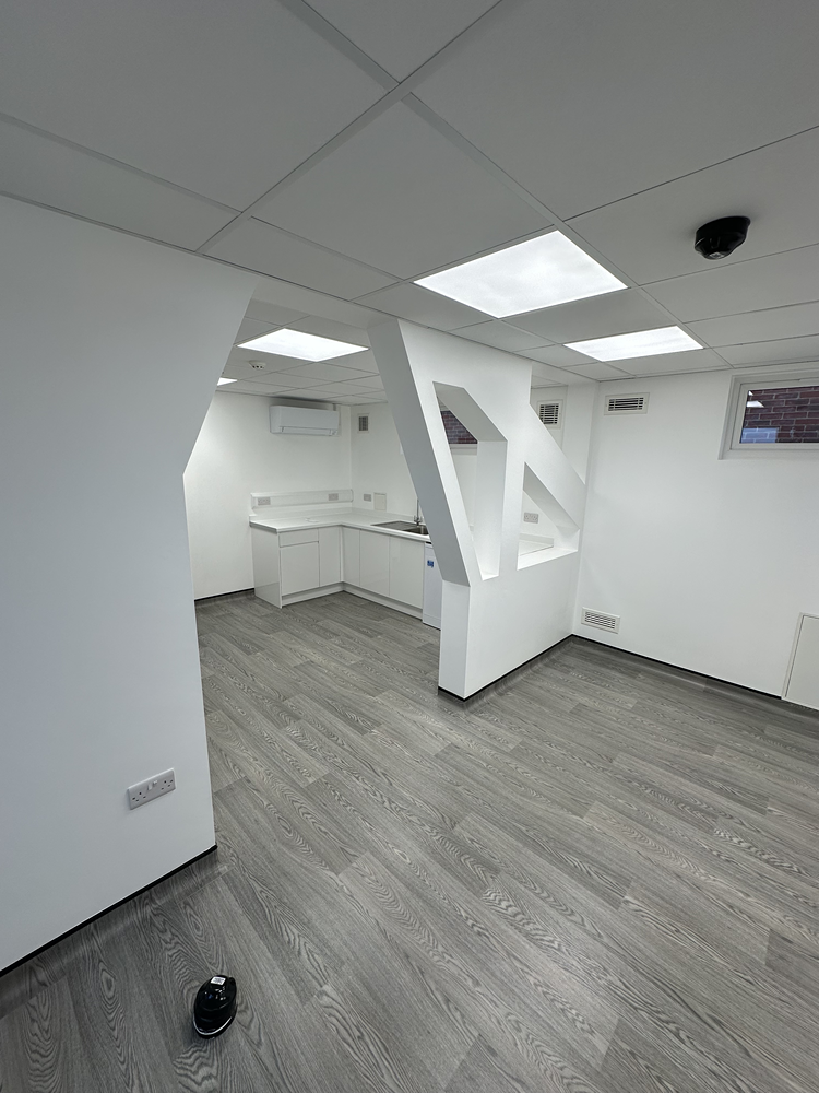 Clinical room during construction with new partitions and worktops